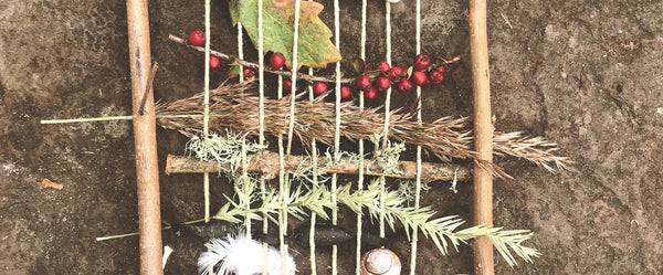 Weaving natural objects including berries, feathers and shells