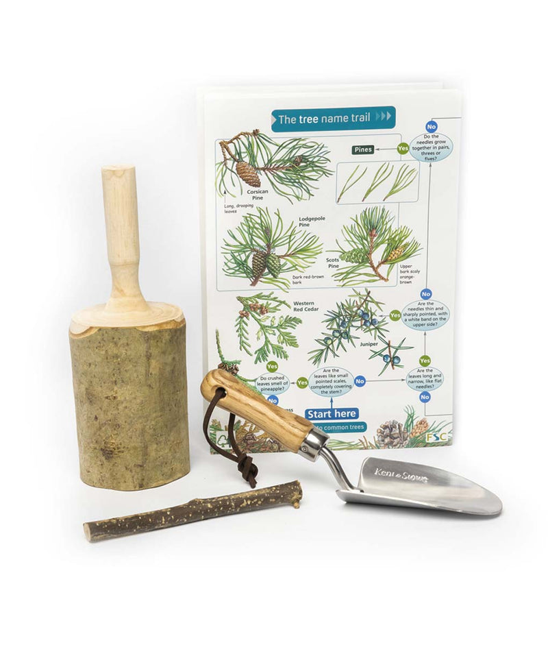 The British Woodland Den Kit’s wooden mallet, trowel and Tree Identification Guide